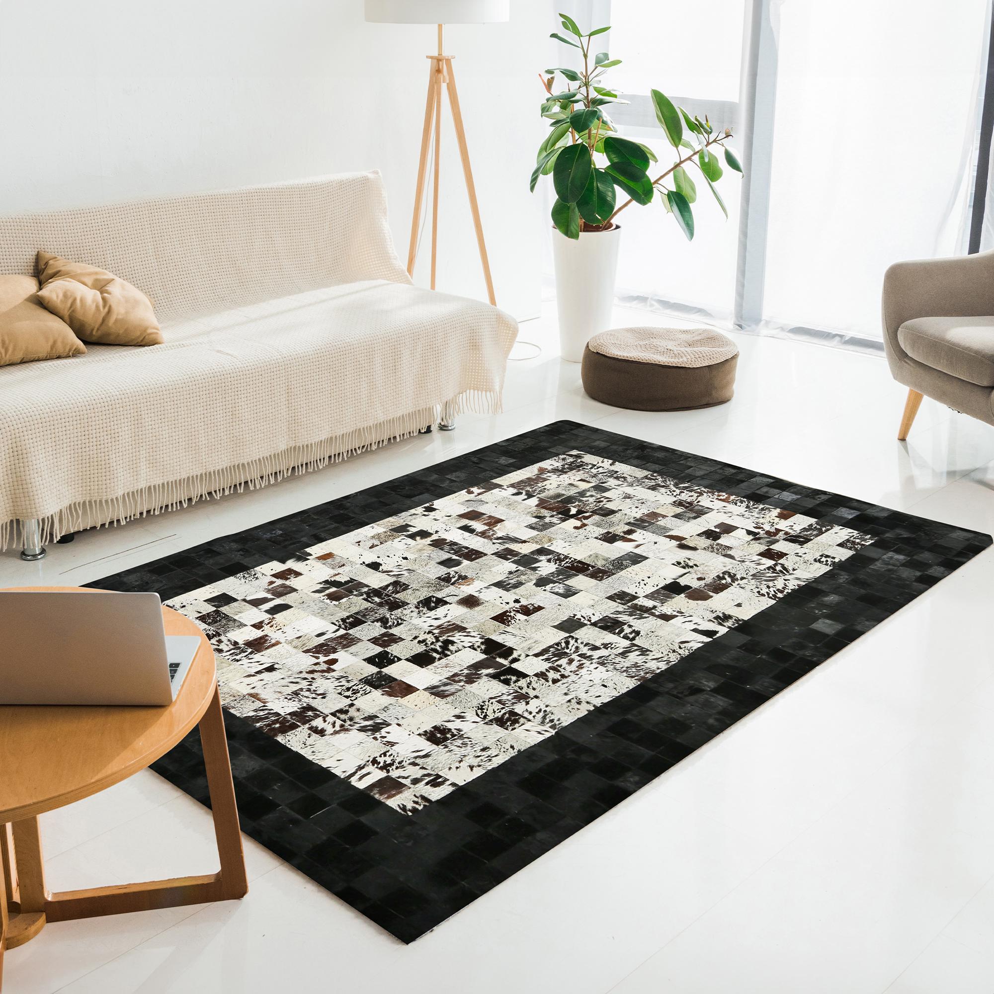 Beyaz Siyah Dana Derisi Patchwork Halı – El Yapımı Hakiki Deri Şık Ev Dekorasyonu Halısı